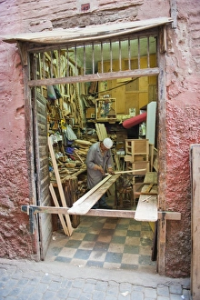 Concentration Prints: Carpenter in his workshop in the souk of Marrakech, Morocco, North Africa, Africa