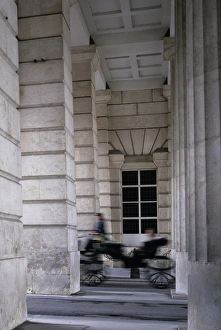 Classical Style Prints: Carriage passing between classical columns, Vienna, Austria, Europe