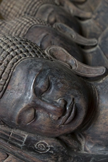 Phnom Penh Prints: Carved Buddha heads, Phnom Penh, Cambodia, Southeast Asia