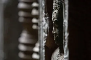 Siem Reap Prints: Detail of the carved facade at one of the temples in Angkor Wat complex