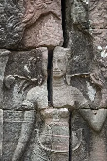Relief Prints: Detail of the carved facade at one of the temples in Angkor Wat complex