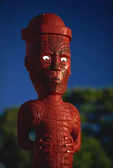 A carved figure or poupou in a Maori village at the Whakarewarewa thermal