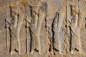 Carved relief of four Royal Persian Guards, facade of Private Palace of Darius the Great (Tachara)