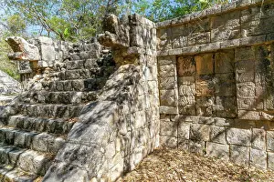 Mesoamerica Prints: Carved stonework figure, possibly erotic on smaller building