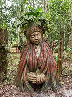 Creativity Prints: Carved wooden statue representing nature in Iquitos, Peru at the manatee rescue center