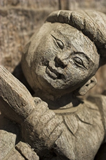 Carving on traditional wooden monastery, once part of the Royal Palace complex
