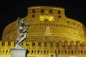 Mausoleum Prints: Castel Sant Angelo facade at night with statue on Ponte Sant Angelo