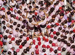 Males Prints: Castell human tower in front of the City Hall during the Festa Major Festival