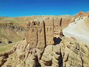 Afghanistan Prints: Castle Gorgaheen stands on rocky terrain in Yaklawang Bamiyan with a clear sky above