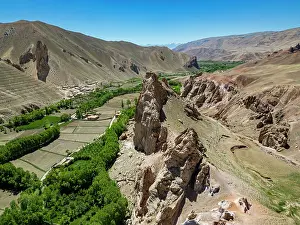 Settlement Prints: Castle Gorgaheen in Yaklawang shows the rocky landscape and agricultural areas in Bamiyan