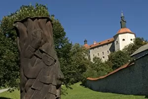 Castle and sculpture in village of Sofja Loka, Slovenia, Europe