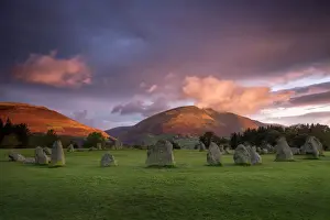 Cumbria Prints: Castlerigg Stone Circle in autumn at sunrise with Blencathra bathed in dramatic dawn light