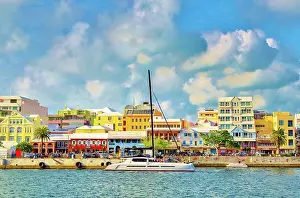 Catamaran Prints: Catamaran passing pastel coloured buildings on Front Street
