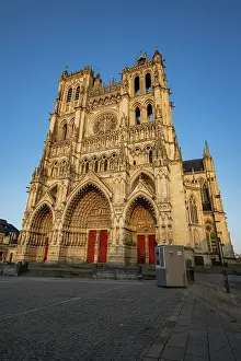 Large Prints: Cathedral of Amiens shows impressive architecture and intricate design against a clear blue sky in France