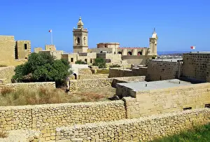 Renaissance Prints: Cathedral church tower and ruins inside citadel castle walls Il-Kastell