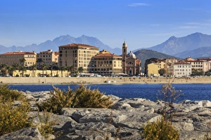 Corsica Prints: Cathedral, city and hazy mountains, from its rocky waterfont, Ajaccio, Island of Corsica
