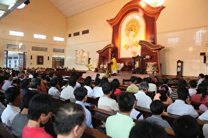 View From Behind Prints: Catholic Mass in a Vietnamese church, Ho Chi Minh City, Vietnam, Indochina