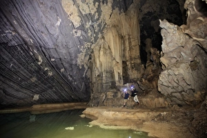 40 44 Years Prints: Cavers in Hang Roc (Ruc Mon) cave in Phong Nha