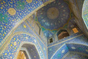 Typically Iranian Prints: Ceiling of entrance portal in Isfahan blue, Imam Mosque, UNESCO World Heritage Site