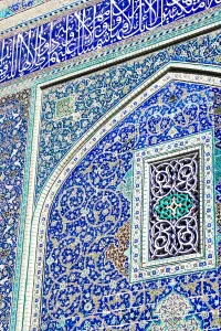 Typically Iranian Prints: Detail of ceramic tiles on wall in Isfahan blue, Imam Mosque, UNESCO World Heritage Site