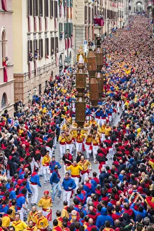 Crowded Prints: Ceri Festival, Race of Ceri in the town, Gubbio, Umbria, Italy, Europe