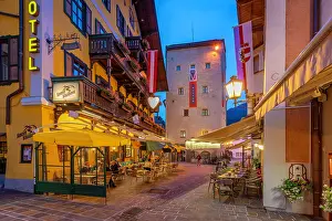 Chairs Prints: Chalet hotel and museum view at dusk in Zell am See