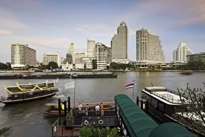 Images Dated 28th February 2010: Chao Phraya River and the modern Bangkok skyline, Bangrak district, Bangkok, Thailand
