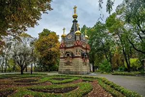 Domes Prints: Chapel tomb Paskevichi stands in a park surrounded by trees and colorful leaves during autumn in Gomel