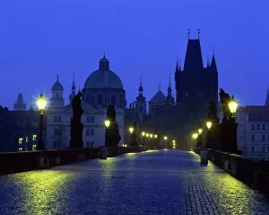 Images Dated 4th February 2008: The Charles Bridge at night and city skyline with spires, UNESCO World Heritage Site