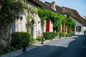 Streets Prints: Charming buildings line a narrow street in Provins