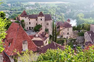 Roofs Prints: Charming buildings and narrow streets in Saint-Cirq-Lapopie village overlooking the Lot River in southwestern France