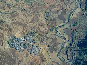 Circles Prints: Charter flight over rural village and farmlands in Madagascar near Isalo National Airport
