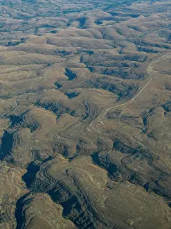 Altitude Prints: Charter flight showcases unique land formations during journey from Isalo National Airport to Antanavarino Charter