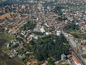 Madagascar Prints: Charter flight view of city landscape over Madagascar showing urban areas and roads near Antanavarino