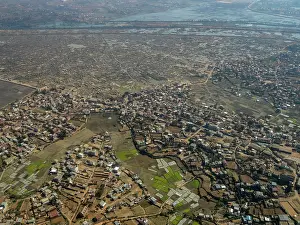 Airport Prints: Charter flight view over the city while traveling from Isalo National Airport to Antanavarino Charter Flight Base
