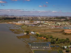 Wetlands Prints: Charter flight views from Antanavarino to Fianarantsoa show city and landscape of Madagascar