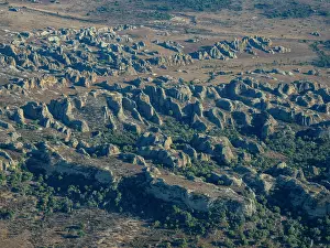 Altitude Prints: Charter flight views over landscapes from Isalo National Airport to Antanavarino Charter Flight Base in Madagascar