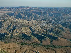 Uninhabited Prints: Charter flight views over the landscapes of Madagascar from Isalo National Airport to Antanavarino Charter Flight Base