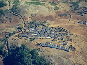 Settlement Prints: Charter flight views of a village during the journey from Isalo National Airport to Antanavarino in Madagascar