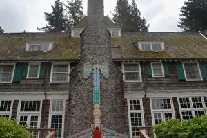 Lodges Prints: Child checking level of rain gauge at Lake Quinault Lodge