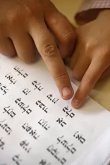 Child learning Hebrew in Jewish school, Paris, France, Europe