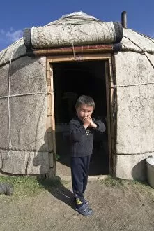 Child in yurt, tent of Nomads at Song Kol, Kyrgyzstan, Central Asia, Asia