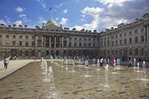 Children playing in summer sun, Edmond J. Safra Fountain Court, Somerset House