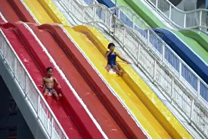 Amusement Park Prints: Children on the water chute of the Big Splash Aquatic Disneyland