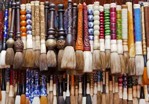Brush Prints: Chinese calligraphy brushes with colorful handcarved handles of stone and wood