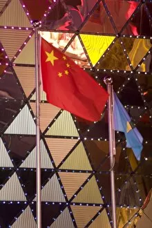 Chinese flag flying outside the Grand Lisboa Casino, Macau, China, Asia