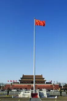 Chinese National flag infront of the Gate of Heavenly Peace in Tiananmen Square Beijing China