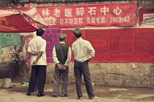 Hanging Prints: Chinese people reading announcement, Xingping, Guangxi Province, China, Asia