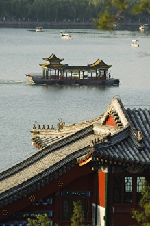Chinese style boats on a lake in Beihai Park, Beijing, China, Asia