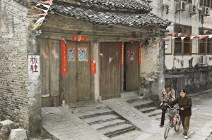Guangxi Prints: Chinese women walking in street, Xingping, Guangxi Province, China, Asia